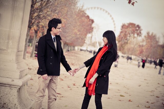engagement photo in paris with a pop of color