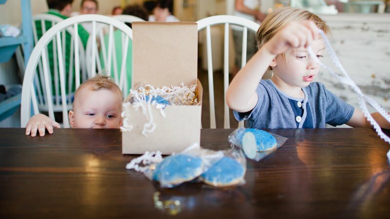 Oh Lovely Day gender reveal at Milk Jar Cookies | photos by Hazelnut Photography & Film by SparkStory