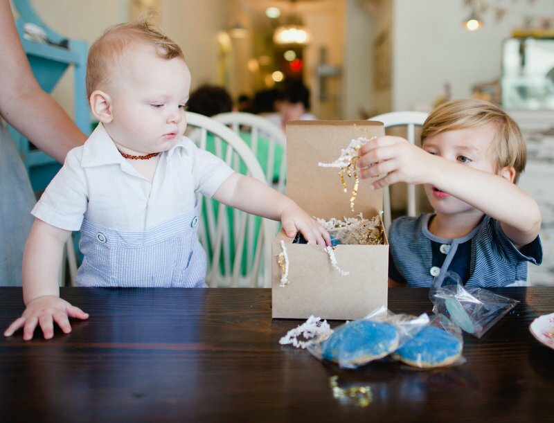 Oh Lovely Day gender reveal at Milk Jar Cookies | photos by Hazelnut Photography & Film by SparkStory